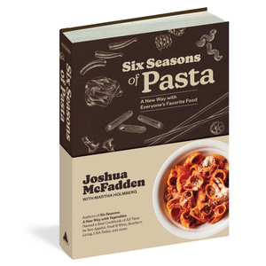 Book titled 'Six Seasons of Pasta' by Joshua McFadden on a white background