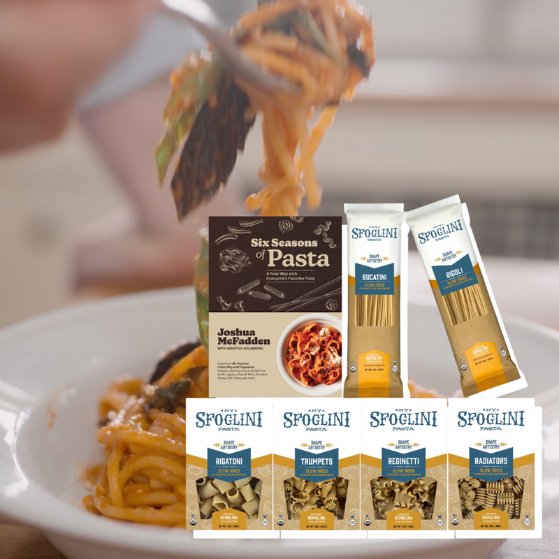 Six Seasons of Pasta Cookbook & Pasta Set - Pasta dish with Spoglini pasta packages displayed on a plate