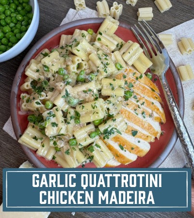 Sfoglini Pasta Recipe: Garlic Quattrotini Chicken Madeira. Pasta dish with chicken and peas on a red plate, surrounded by ingredients. With text overlay "Garlic Quattrotini Chicken Madeira"