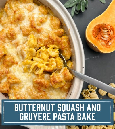 Sfoglini Pasta Recipe:  Butternut squash and Gruyère Zucca pasta bake in a dish with a spoon, surrounded by squash and pasta with Text overlay "Butternut squash and Gruyère pasta bake"