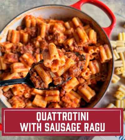 Sfoglini Pasta Recipe: Pasta with sausage ragu in a red pot with a spoonful of pasta above. With Text overlay "Quattrotini With Sausage Ragu"