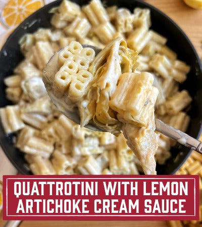 Sfoglini Pasta Recipe:  dish with lemon artichoke cream sauce in a black bowl, with text overlay - Quattrotini with Lemon Artichoke Cream Sauce.
