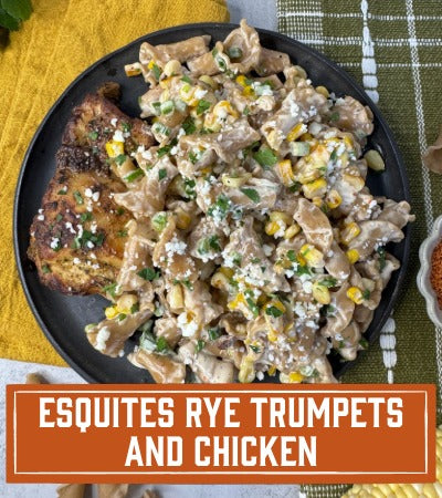 Platter of Esquites Rye Trumpets and Chicken with text overlay on a checkered tablecloth.