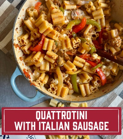 Pasta dish with Italian sausage and vegetables in a pan, labeled 'Quattrotini with Italian Sausage'.