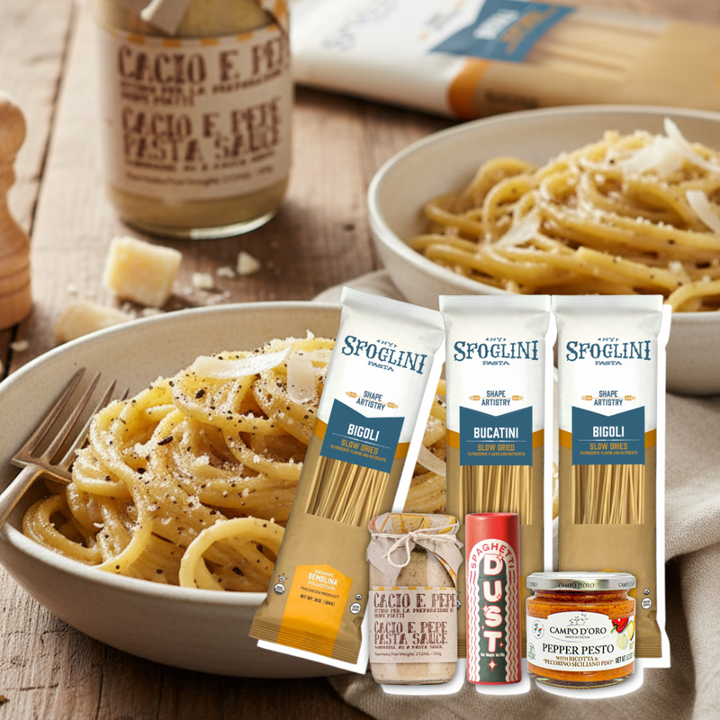 Sfoglini Twirl & Savor Pasta Set - Pasta dish with Bucatini & Bigoli pasta packages and Cacio e Pepe jar on a wooden table.