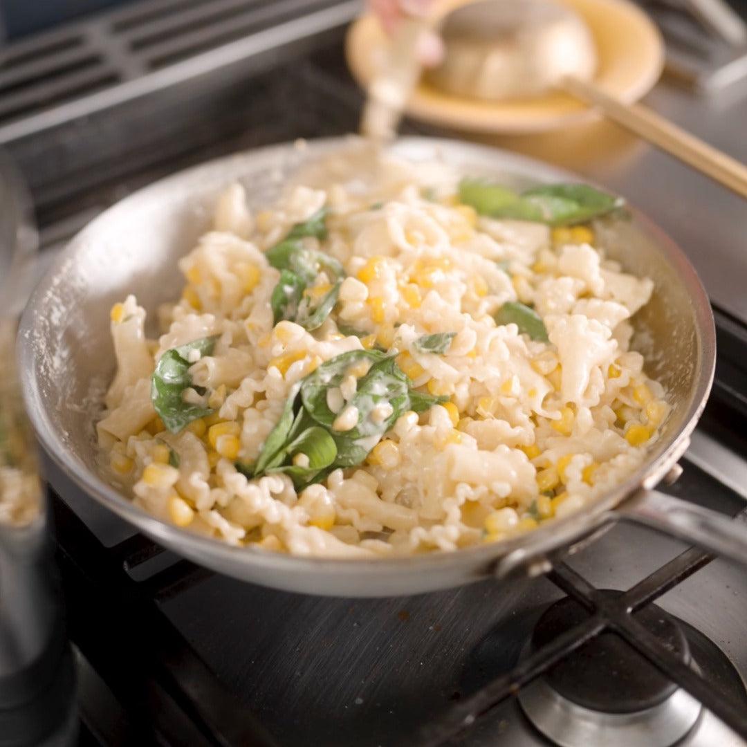 Six Seasons of Pasta Cookbook & Pasta Set - Sfoglini trumpets and vegetables in pan