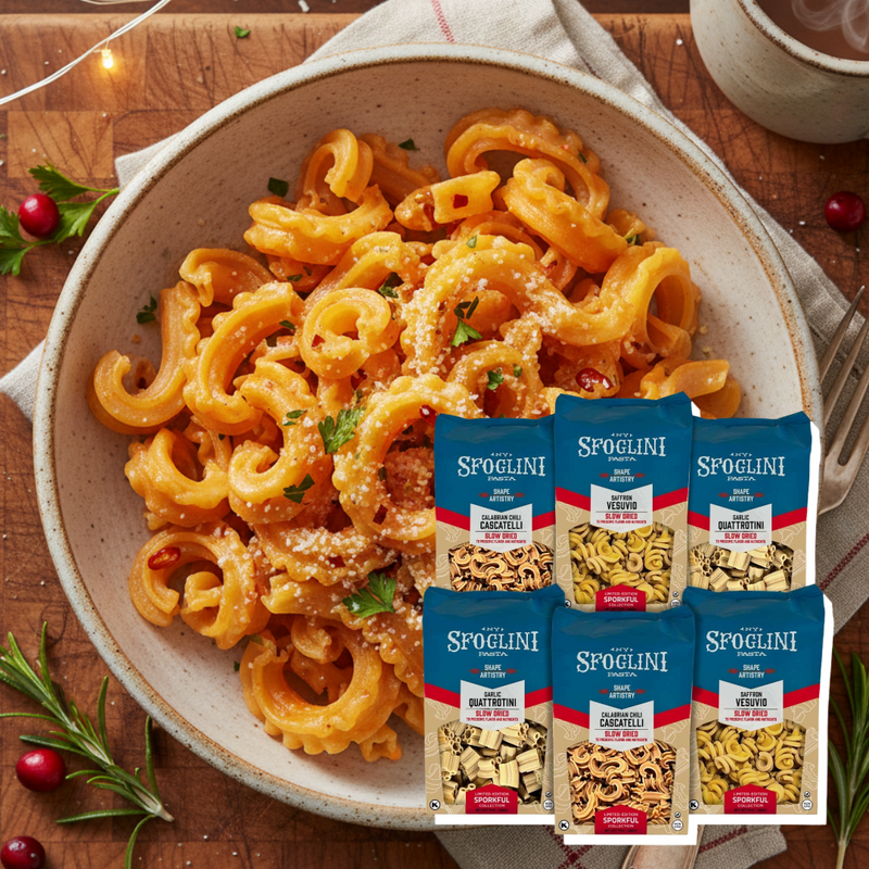 The Limited-Edition Sporkful Collection—Calabrian Chili Cascatelli, Garlic Quattrotini, and Saffron Vesuvio—_ bags of pasta on cooked pasta dish