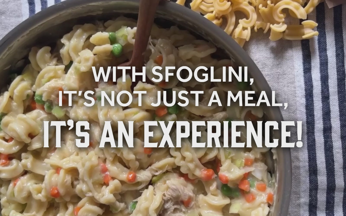 Video of Sfoglini Cascatelli by Sporkful Chicken pot pie being stirred.  With the text "With Sfoglini, it's not just a meal, it's an experience!"