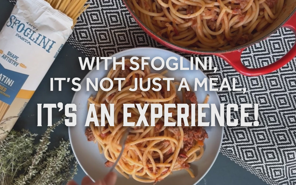 Video of Sfoglini Bucatini with meat sauce being twirled on a fork. With the text "With Sfoglini, it's not just a meal, it's an experience!"